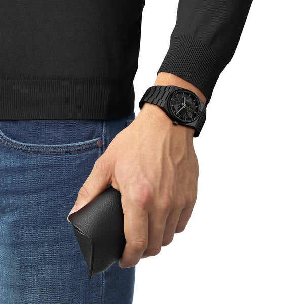 TISSOT 天梭 PRX 系列80小時自動款黑色PVD金剛戰神50周年特別款 40mm T1374073305101